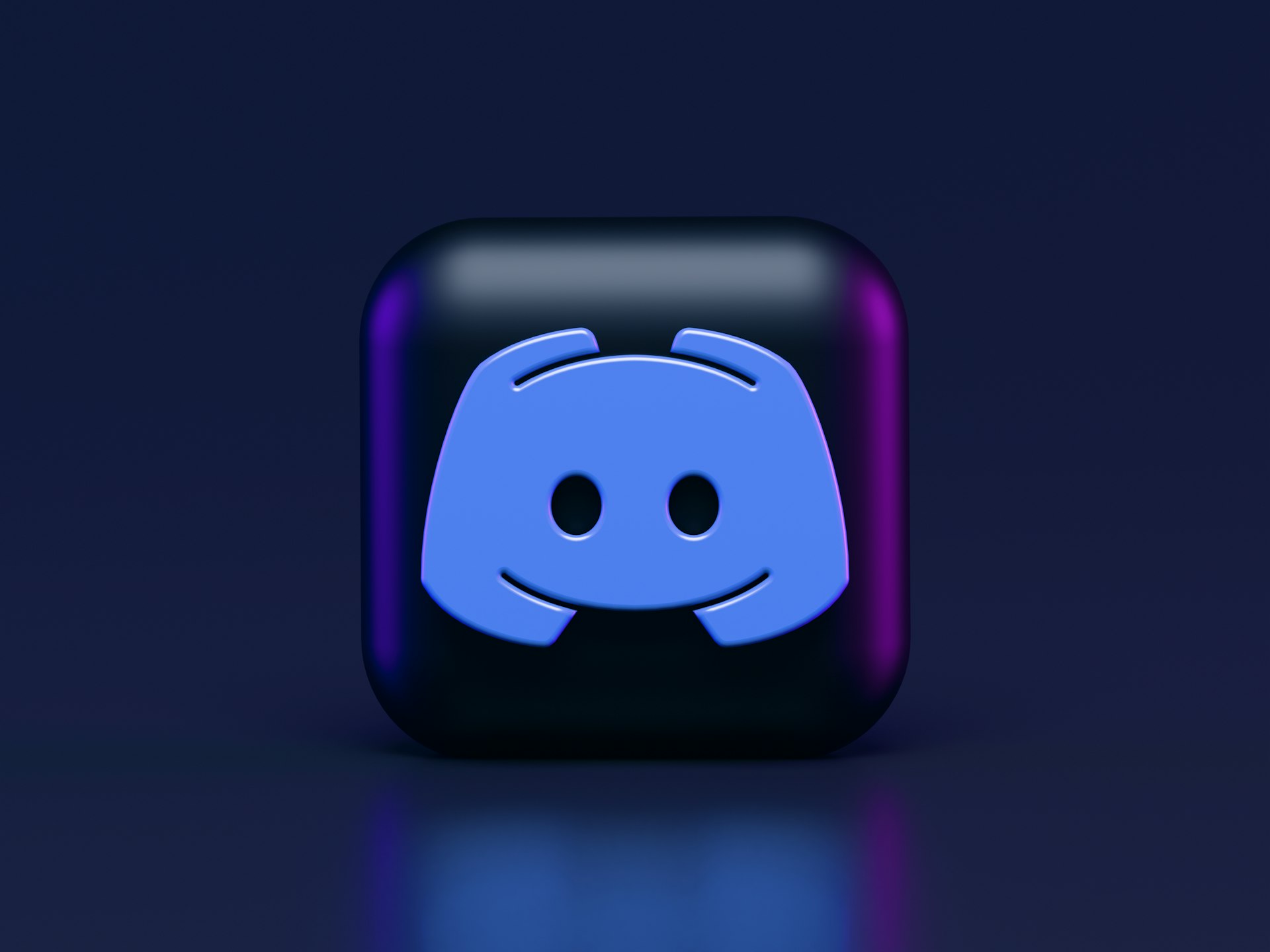 Un Discord communautaire Photo : Logo Discord sur support physique